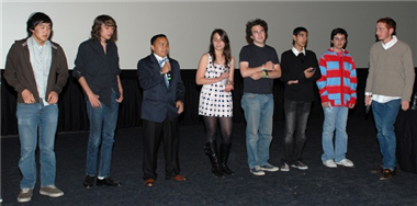 Student filmmakers are introduced after the screening.